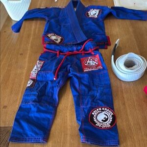 Blue Martial Arts Gi with Red Accents